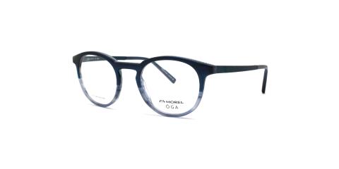 عینک طبی اوگا فریم کائوچویی گرد رو رنگ، رنگ آبی تیره و آبی روشن طرح سنگ - عکس از زاویه سه رخ