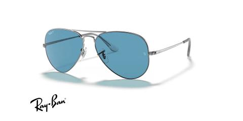 عینک آفتابی خلبانی ری بن فلزی دو پل - نقره ای و عدسی آبی - عکس از زاویه سه رخ