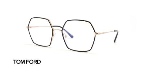 عینک طبی زنانه تام فورد فریم فلزی چند ضلعی به رنگ مشکی طلایی - عکس از زاویه سه رخ