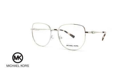 عینک طبی زنانه پروانه ای رنگ نقره ای فلزی مایکل کورس - عکاسی وحدت - زاویه سه رخ