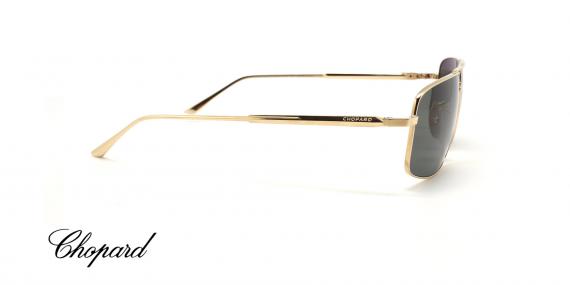 عینک آفتابی پلاریزه شوپارد فریم خلبانی دو پل فلزی طلایی و عسی دودی - عکس از زاویه کنار