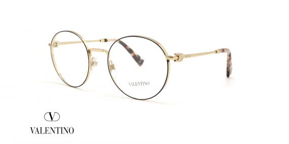 عینک طبی ولنتینو فریم فلزی گرد رنگ طلایی-مشکی روی دسته ها یک تکه فلزی کار شده - عکس از زاویه سه رخ