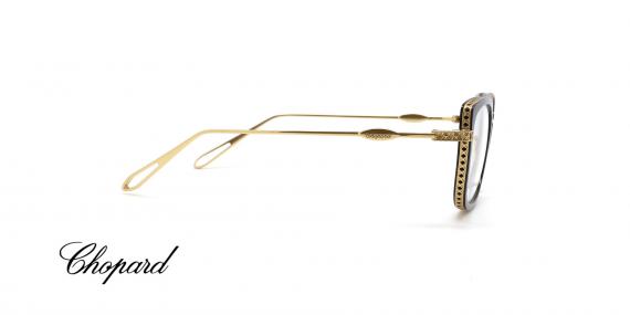 عینک طبی کائوچویی فلزی شوپارد با طرح طلایی روی دسته ها و دور قاب مدل گربه ای زنانه - عکس از زاویه کنار
