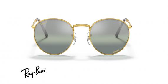 عینک آفتابی ری بن مدل گرد طرح جدید فریم فلزی طلایی براق و عدسی نقره ای آبی جیوه ای پلاریزه - عکس از زاویه روبرو