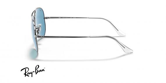 عینک آفتابی خلبانی ری بن فلزی دو پل - نقره ای و عدسی آبی - عکس از زاویه کنار