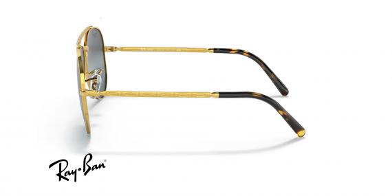 عینک آفتابی ری بن فریم فلزی خلبانی طرح جدید طلایی و عدسی آبی نقره ای کرومانس و پلاریزه - عکس از زاویه کنار