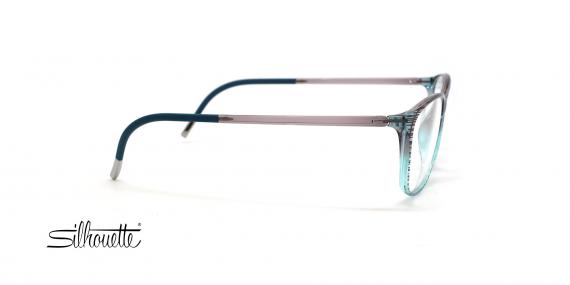 عینک طبی زنانه مدل گربه ای سیلوئت فریم شیشه ای آبی با خطوط مشکی روی آن - عکس از زاویه کنار