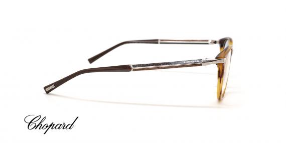 عینک طبی شوپارد فریم کائوچویی حدقه گرد قهوه ای هاوانا دسته ها کربن و چوب - عکس از زاویه کنار