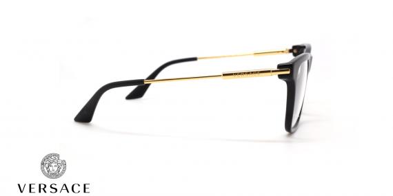 عینک طبی ورساچه فریم کائوچویی مربعی مشکی با دسته های طلایی فلزی گرد - عکس از زاویه کنار
