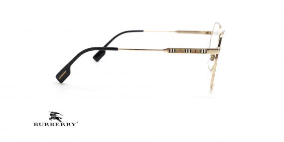 عینک طبی بربری فیم فلزی چند ضلعی رنگ طلایی - عکس از زاویه کنار