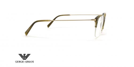 عینک طبی جورجیو آرمانی فریم کائوچویی زیر گریف رنگ سبز و حدقه های بیضی شکل - عکس از زاویه کنار