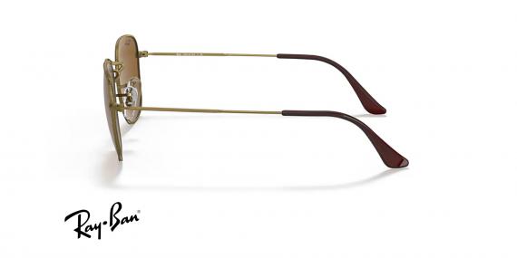 عینک آفتابی ری بن مدل فرانک آنتیک فریم فلزی مربعی رنگ طلایی آنتیک و عدسی قهوه ای - عکس از زاویه کنار