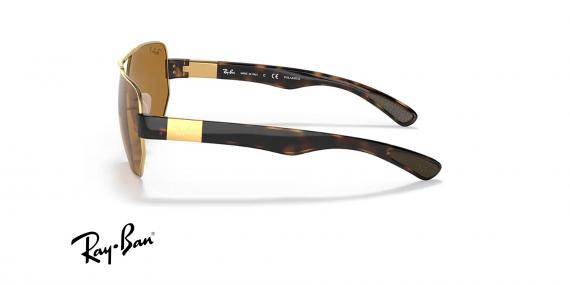 عینک آفتابی ری بن فریم چند ضلعی طلایی عدسی قهوه ای پلاریزه - عکس از زاویه کنار