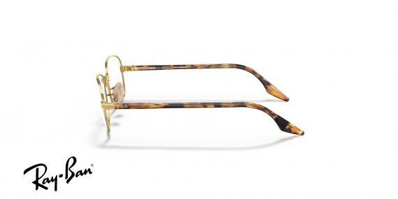 عینک طبی ری بن فریم فلزی شبه مربعی طلایی رنگ - عکس از زاویه کنار