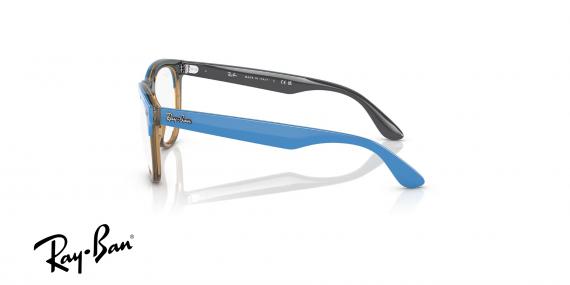عینک طبی ری بن مدل آیریس فریم کائوچویی گرد دو رنگ آبی براق و قهوه ای عسلی - عکس از زاویه کنار