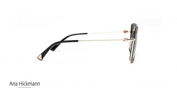 عینک آفتابی کائوچویی پروانه‌ای آناهیکمن فریم مشکی و عدسی سورمه ای طیف دار - عکس از زاویه کنار