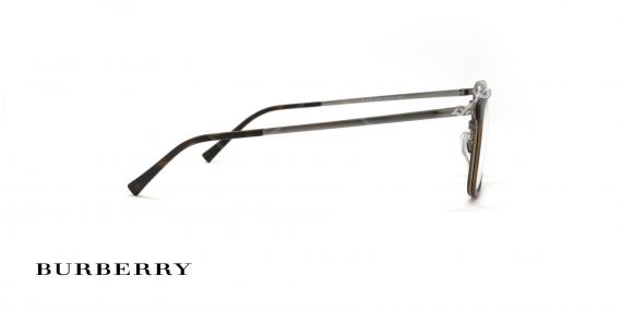 عینک طبی burberry مستطیل شکل دسته فلزی نوک مدادی حدقه کائوچویی قهوه ای هاوانا - عکاسی وحدت - زاویه سه رخ