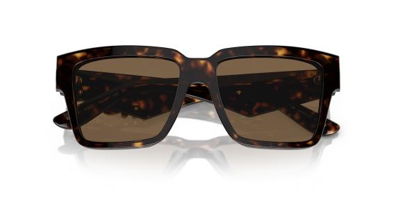 عینک آفتابی دولچه و گابانا فریم کائوچویی مربعی بزرگ رنگ قهوه ای هاوانا با دسته های پهن با طرح طلایی به همراه عدسی قهوه ای - عکس از زاویه بسته عینک