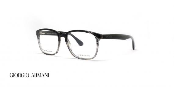 عینک طبی کائوچویی مستطیلی شکل جورجیو ارمانی - بدنه مشکی چند رنگ به سمت شیشه ای - عکاسی وحدت - زاویه سه رخ