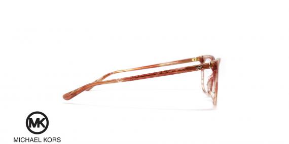 عینک طبی زنانه مربعی رنگ صورتی کائوچویی مایکل کورس - عکاسی وحدت - زاویه کنار