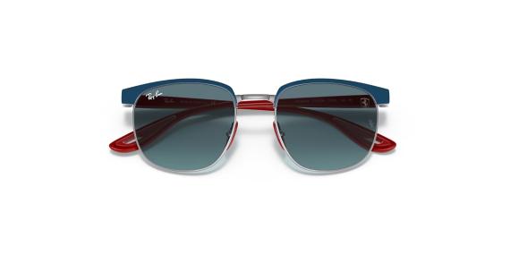 عینک آفتابی ری بن مدل فراری فریم فلزی سورمه ای براق با دسته های قرمز و عدسی آبی طیف دار - عکس از زاویه بسته