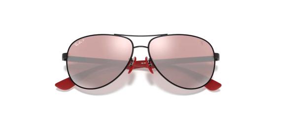 عینک آفتابی پلاریزه خلبانی ری بن فریم فلزی مشکی به همراه عدسی صورتی جیوه ای کرومانس - عکس از زاویه بسته عینک