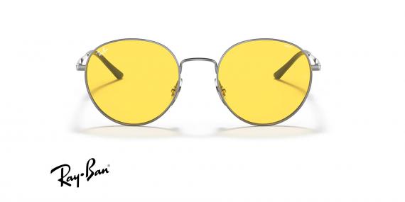 عینک آفتابی ری بن فریم فلزی گرد نقره ای براق و عدسی زرد فتوکرومیک - عکس از زاویه روبرو
