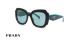 عینک آفتابی زنانه پرادا فریم کائوچویی مربعی-پروانه ای مشکی با دسته های سبز آبی و عدسی سبز آبی روشن - عکس از زاویه سه رخ