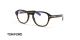 عینک طبی کائوچویی بیضی شکل تام فورد - رنگ قهوه ای هاوانا - عکس از زاویه سه رخ