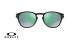 عینک آفتابی گرد اوکلی - با عدسی های پریزم از داخل دودی از بیرون جیوه ای بدنه مشکی - ویژه فروش آنلاین - زاویه روبرو