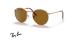 عینک آفتابی ری بن مدل گرد طرح جدید فریم فلزی رزگلد و عدسی قهوه ای - عکس از زاویه سه رخ