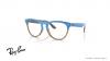 عینک طبی ری بن مدل آیریس فریم کائوچویی گرد دو رنگ آبی براق و قهوه ای عسلی - عکس از زاویه سه رخ