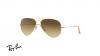 عینک آفتابی خلبانی ریبن - رنگ بدنه طلایی - شیشه قهوه ای طیف دار - زاویه سه رخ